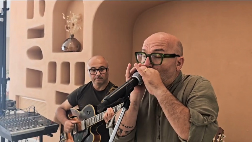 Chitarra voce e armonica