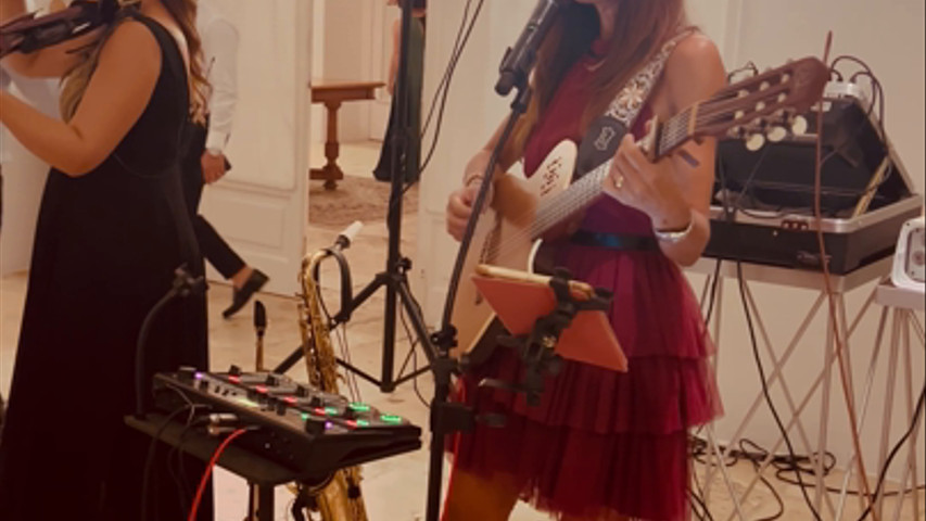 Voice Guitar Loop and Violin. An elegant female duo.