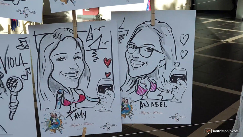 Video caricature esposte con tableau de mariage che si è trasformato in un quadro per firme e dediche