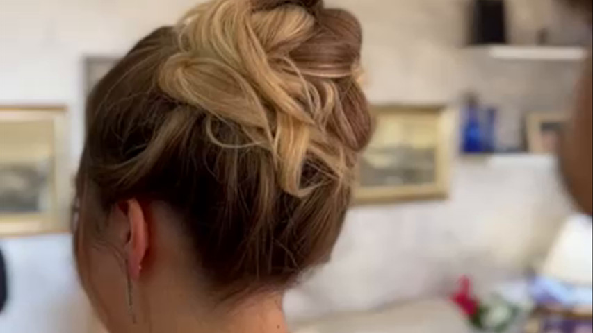 Chignon alto stile elegant da sposa